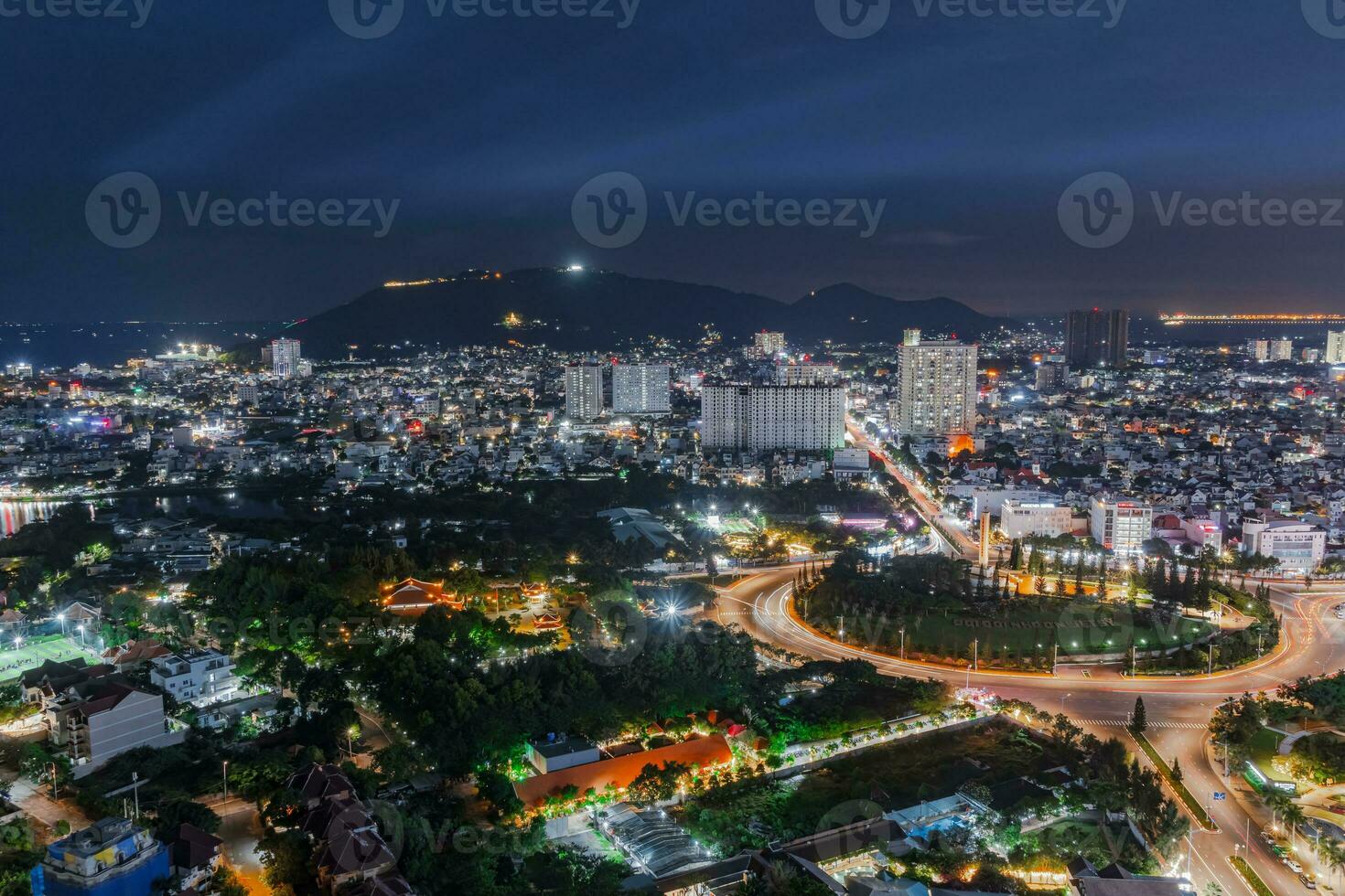 Night in Vung Tau city and coast, Vietnam. Vung Tau is a famous coastal city in the South of Vietnam photo