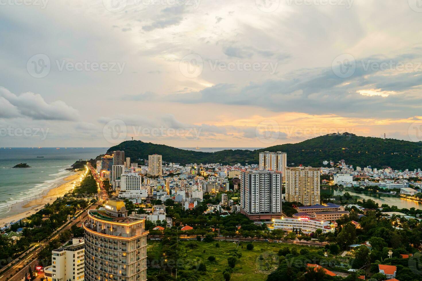 Sunset in Vung Tau city and coast, Vietnam. Vung Tau is a famous coastal city in the South of Vietnam photo