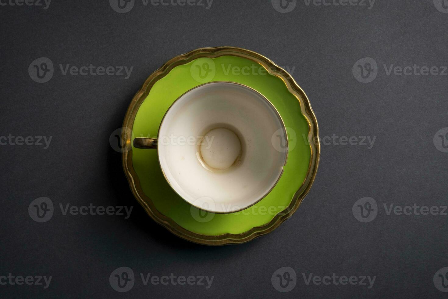 green tea cup on a gray background photo