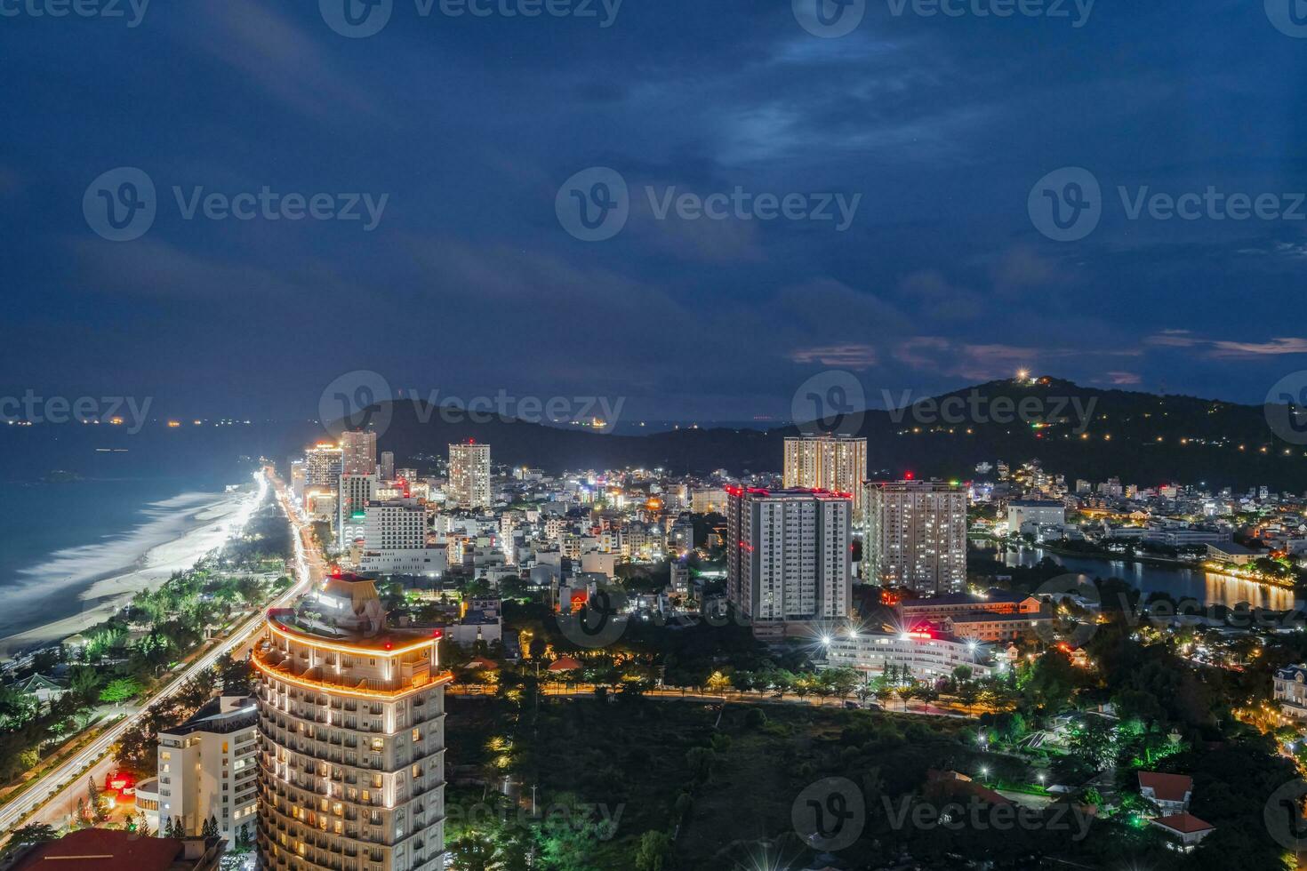 Night in Vung Tau city and coast, Vietnam. Vung Tau is a famous coastal city in the South of Vietnam photo