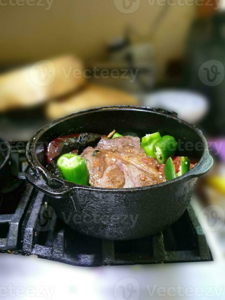 Braised beef pot roast with  jalapenos and Mexican chilis photo