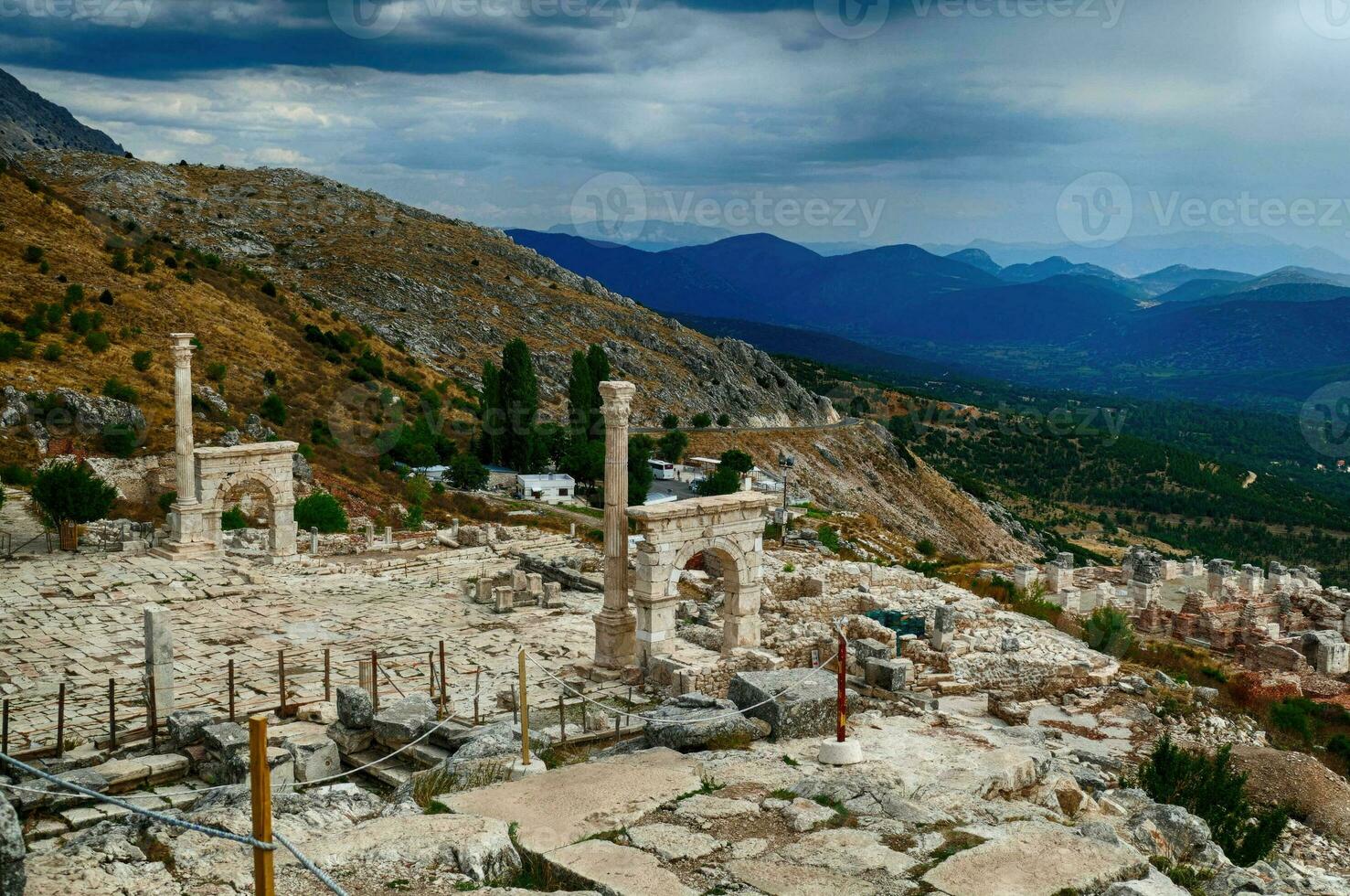 Columns and arches of ancient Roman agora photo