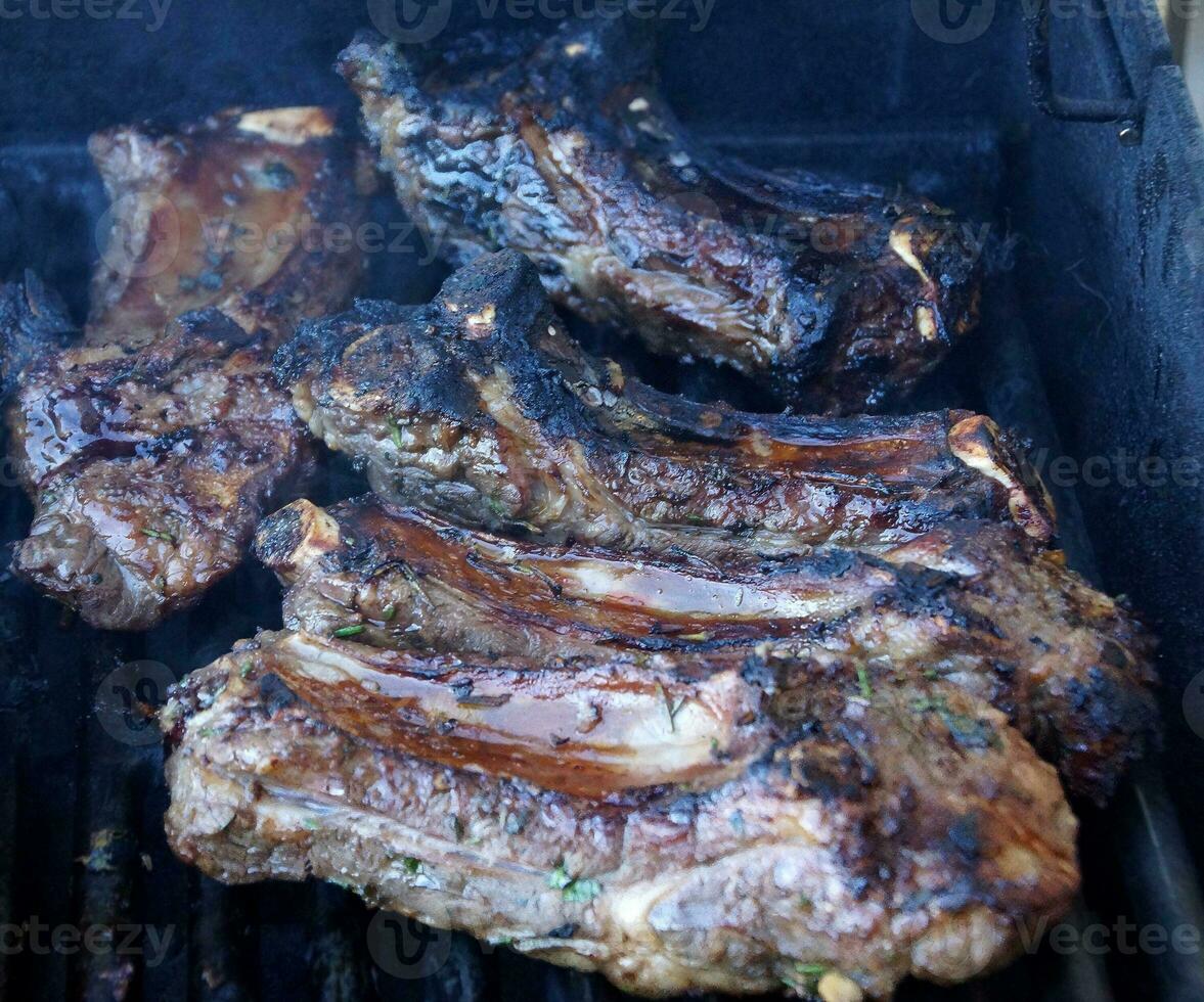 Marinated beef ribs and corn photo