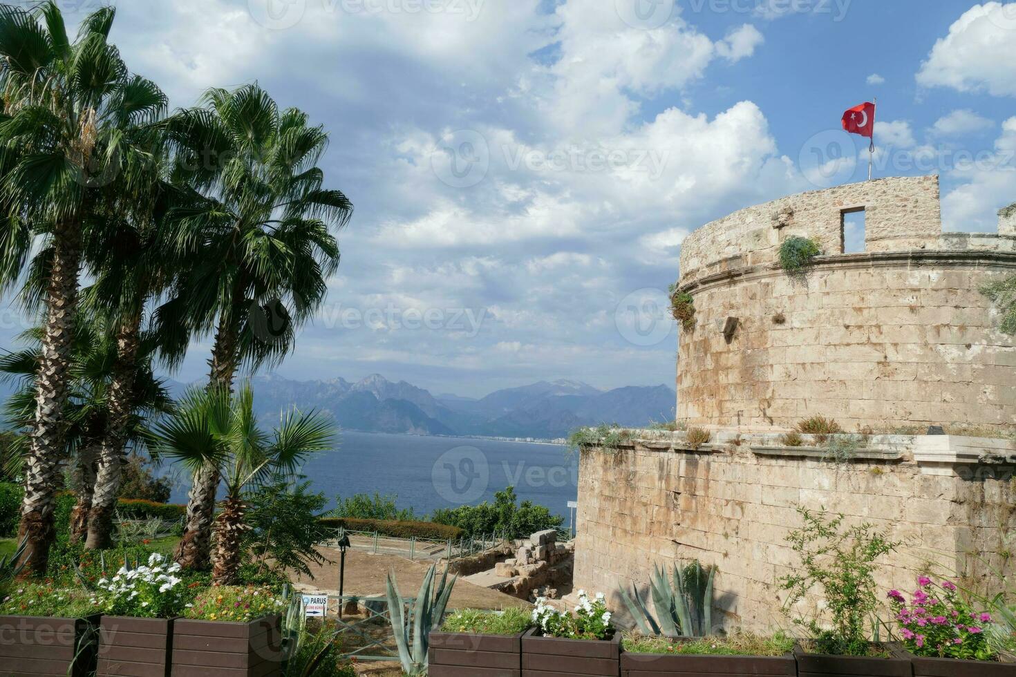 Ancient defensive tower on cliff photo