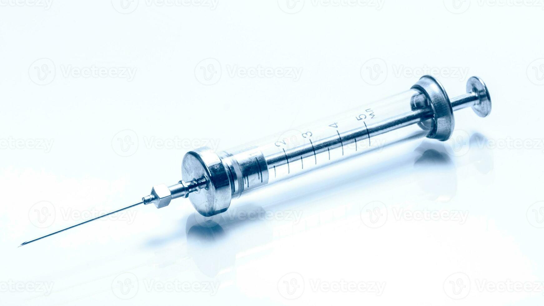 Vintage Glass Syringe, Nostalgic Medical Relic isolated photo