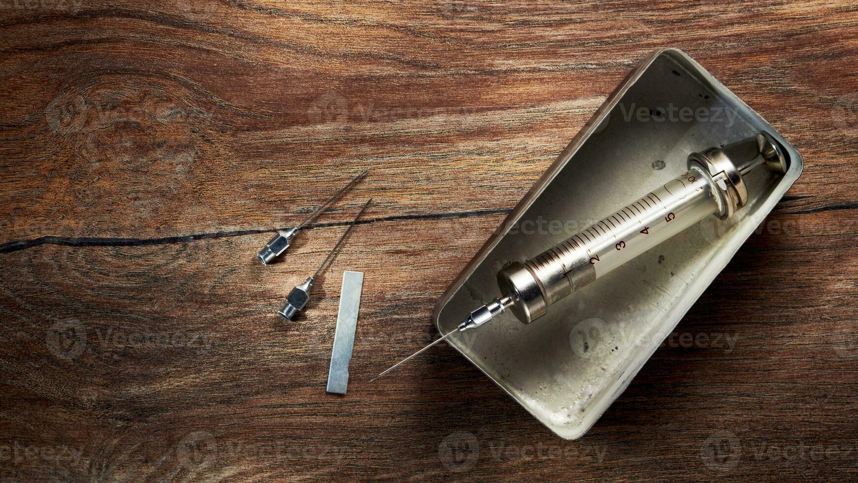Vintage Glass Syringe, Nostalgic Medical Relic isolated photo