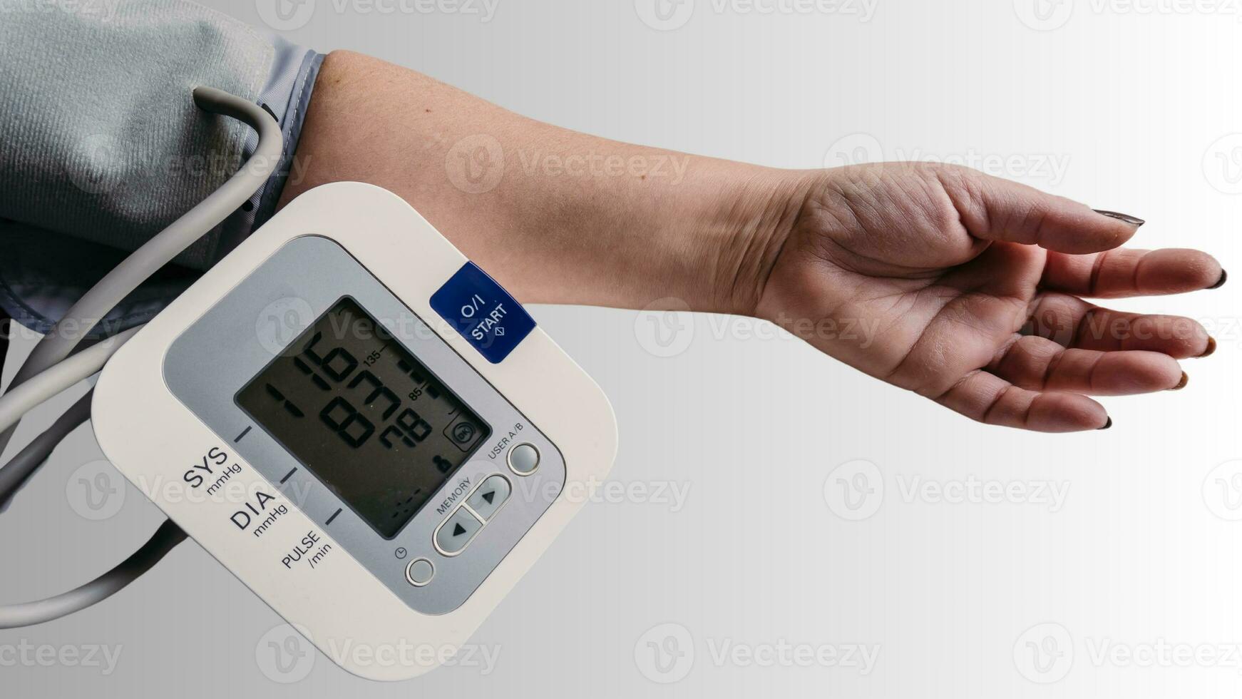 Isolated Blood Pressure Meter on White Background, Healthcare Monitoring Equipment photo