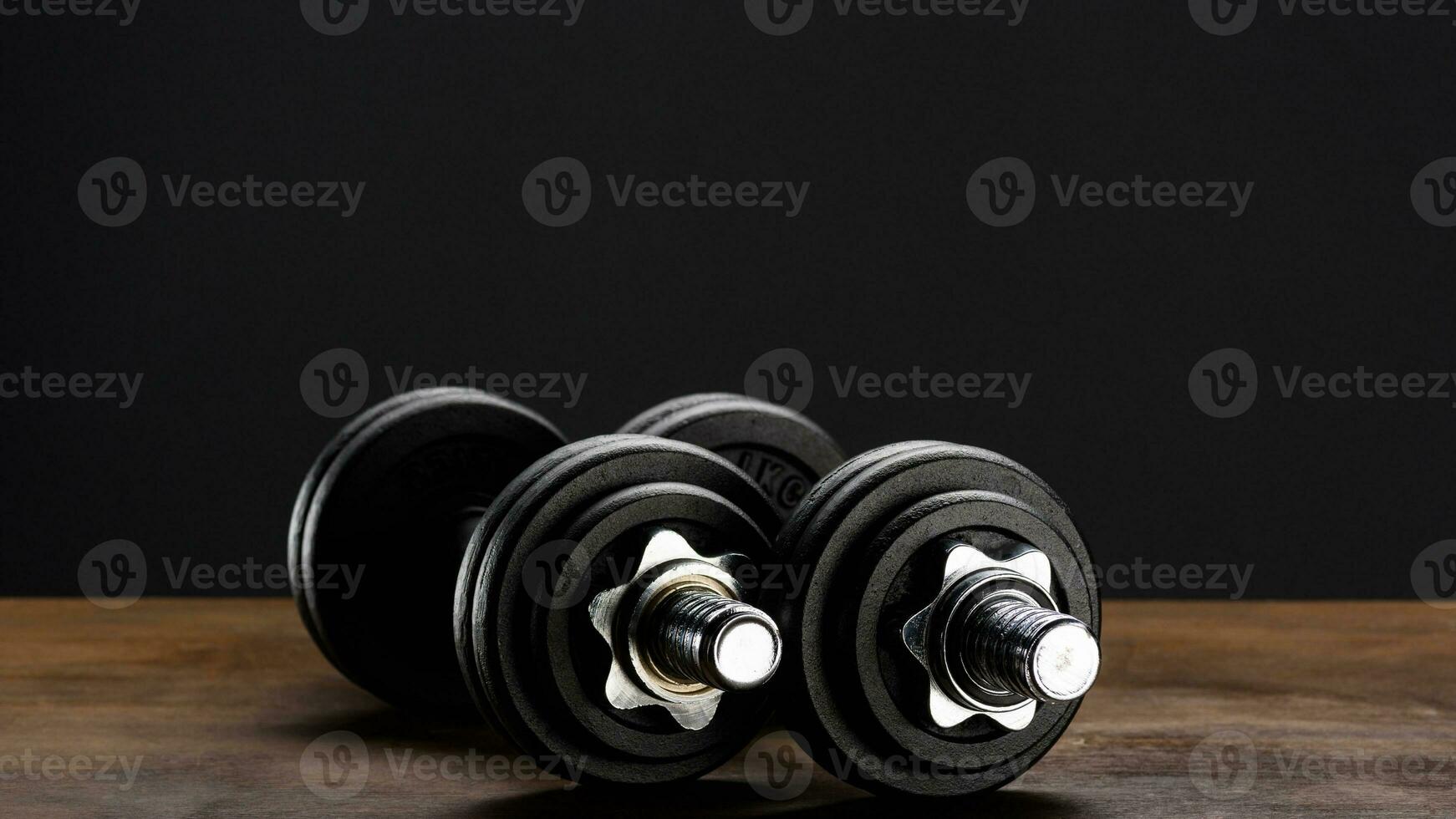 Isolated Dumbbell Concept. Fitness Equipment for Gym Workout, Strength Training, Bodybuilding, and Powerlifting photo