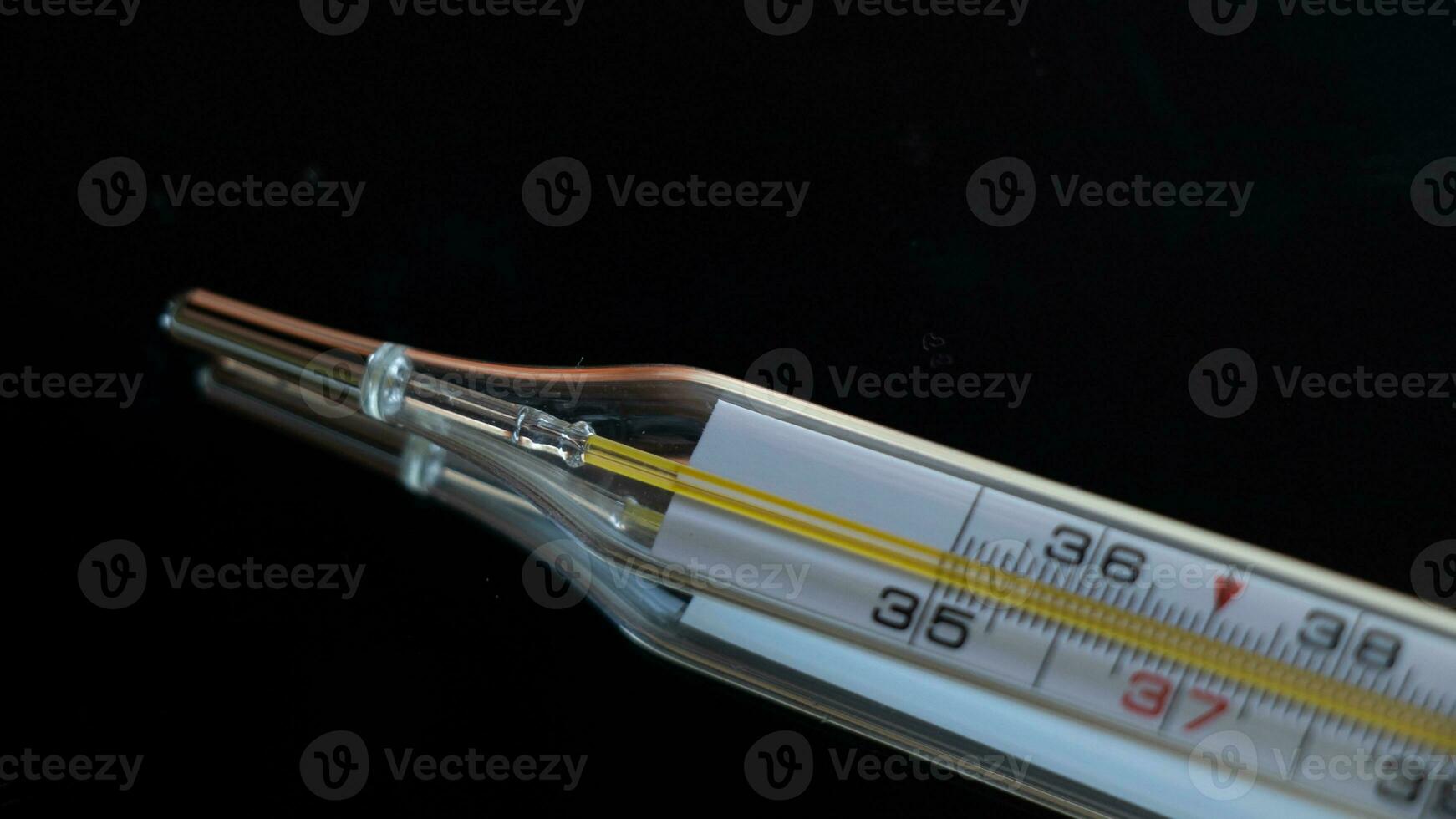 Glass Thermometer, Mercury Thermometer Isolated photo