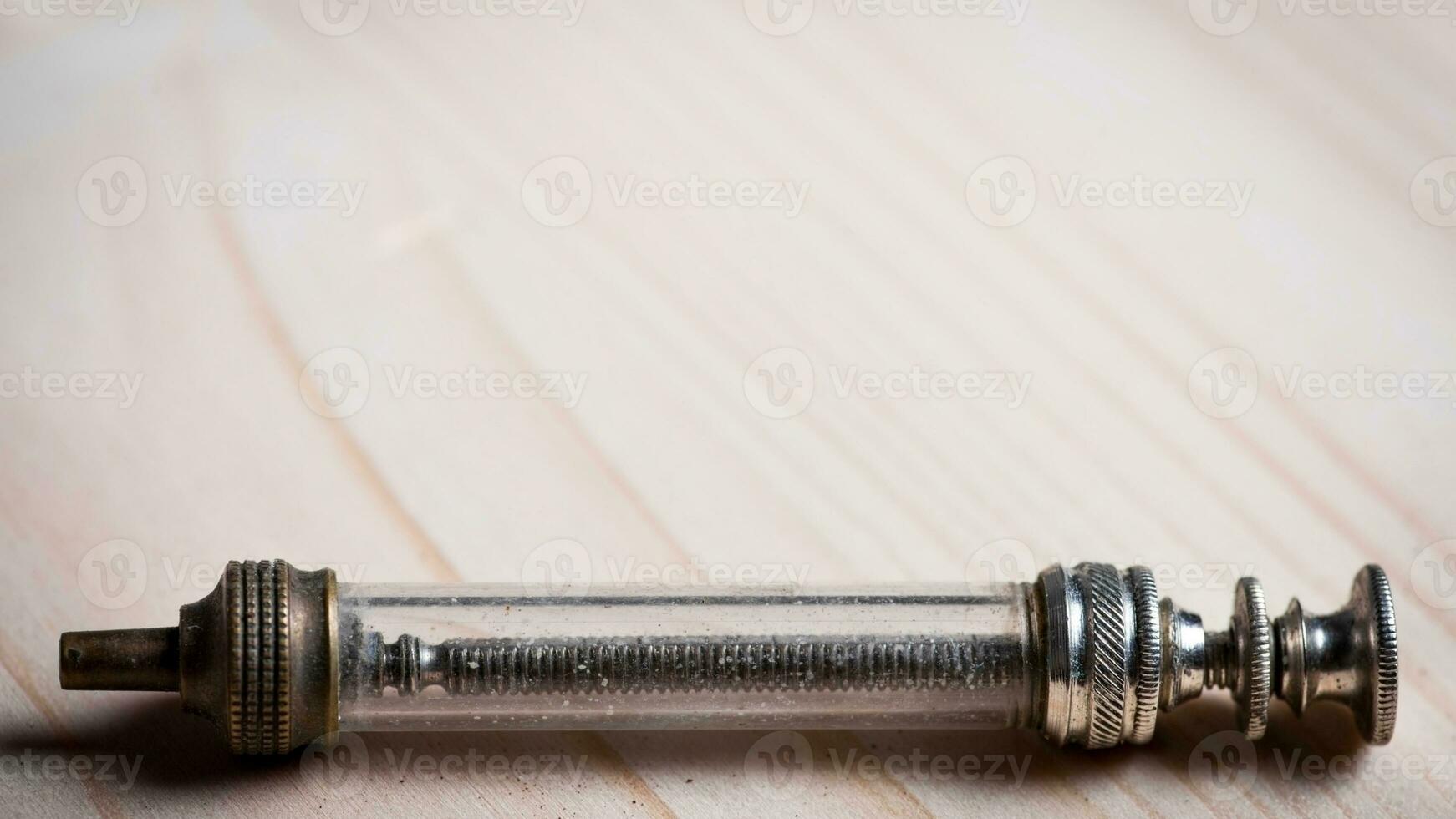 Vintage Glass Syringe, Nostalgic Medical Relic isolated photo