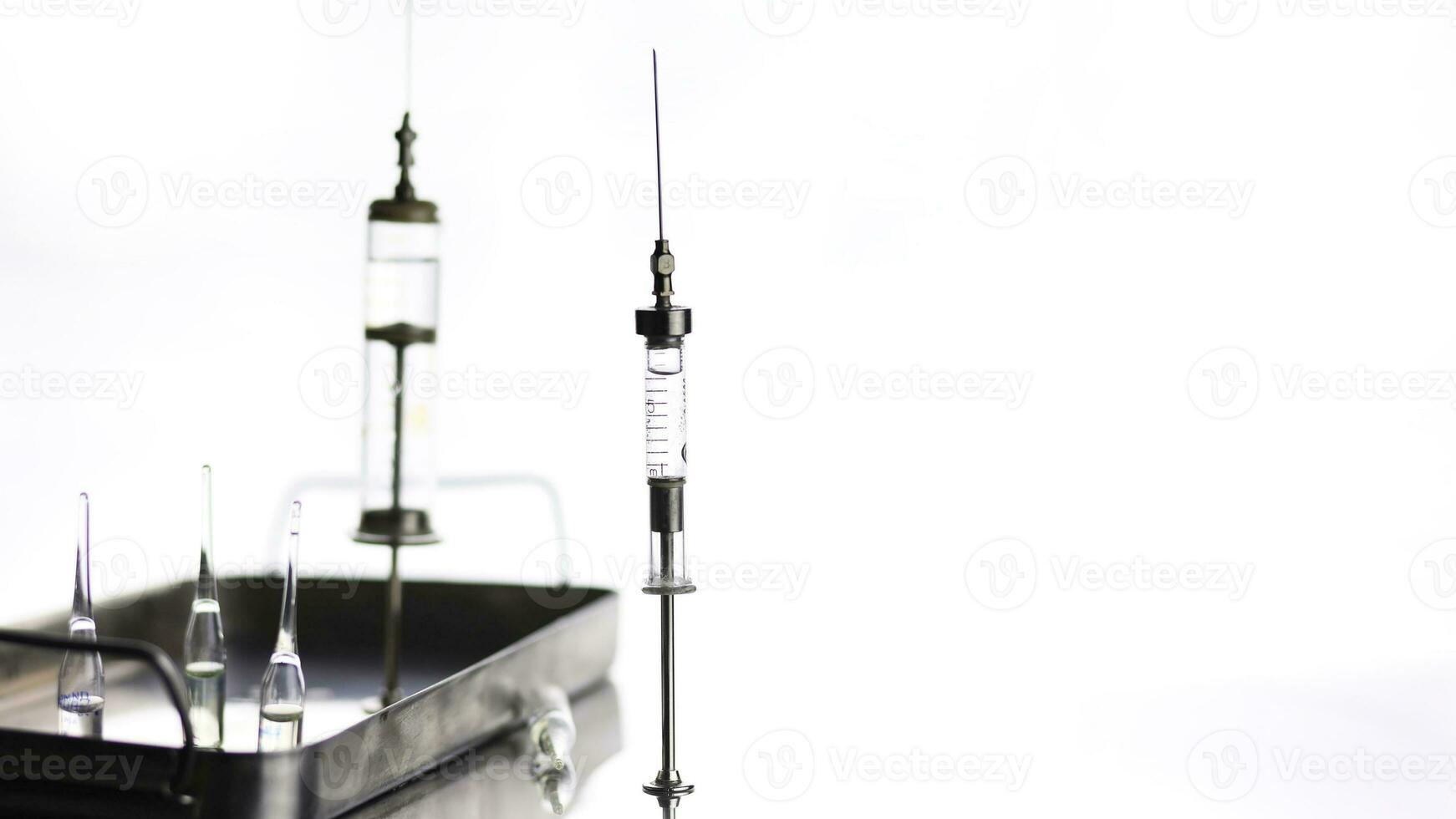 Vintage Glass Syringe, Nostalgic Medical Relic isolated photo