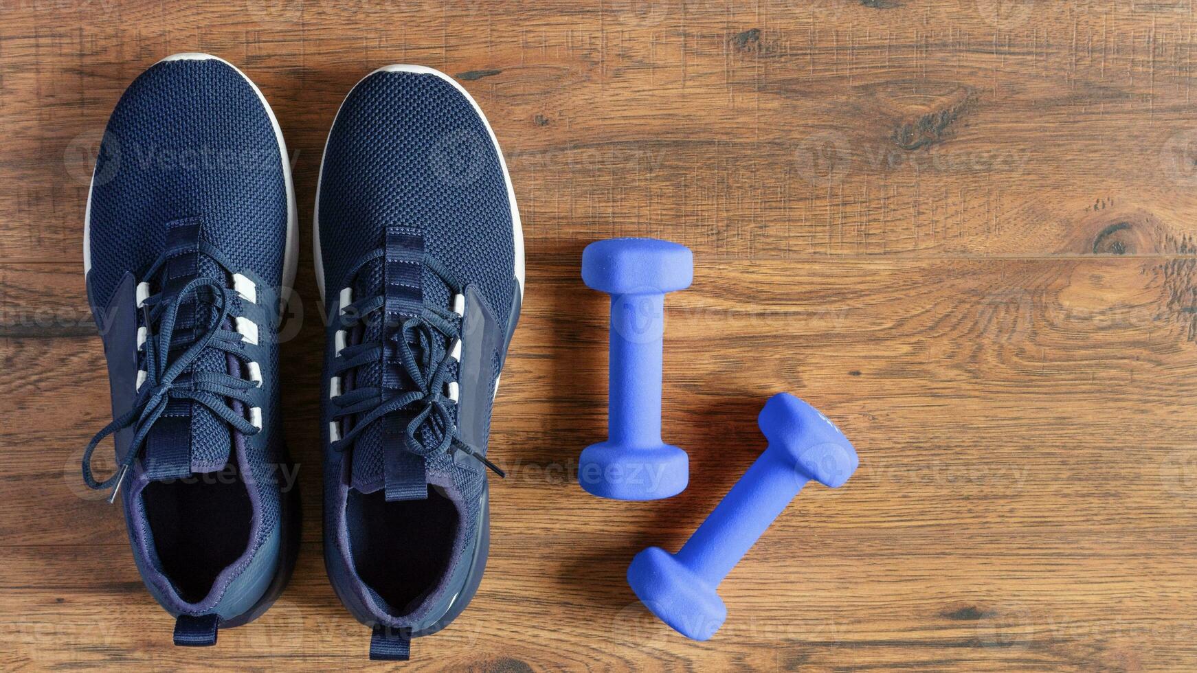 Isolated Dumbbell Concept. Fitness Equipment for Gym Workout, Strength Training, Bodybuilding, and Powerlifting photo