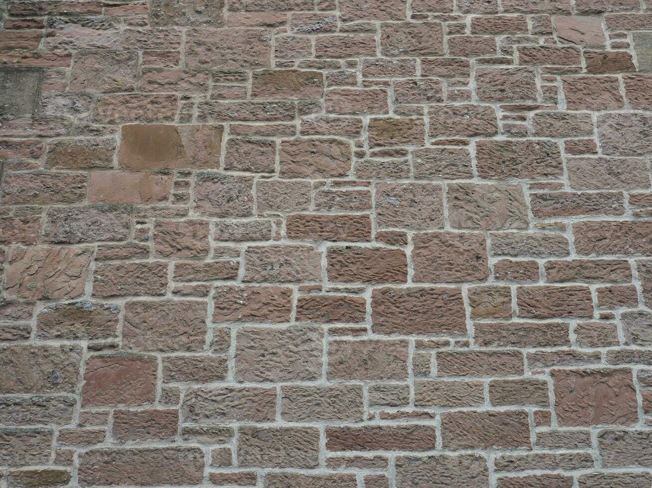 red stone wall background photo