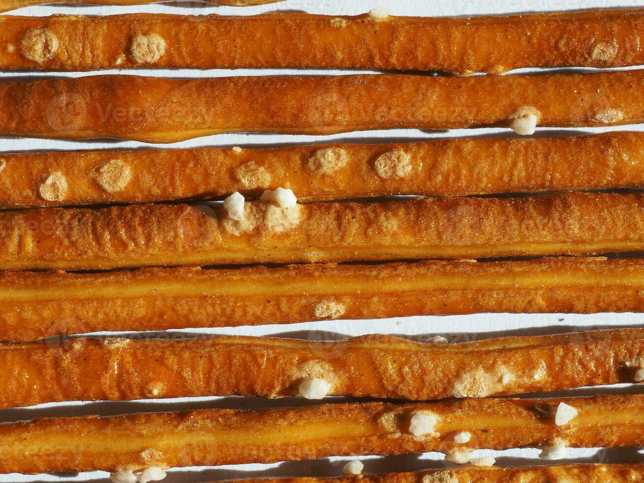salted sticks snacks baked food background photo