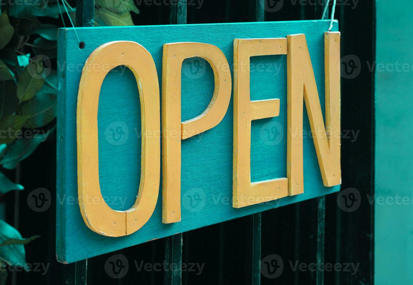 open sign in shop window photo