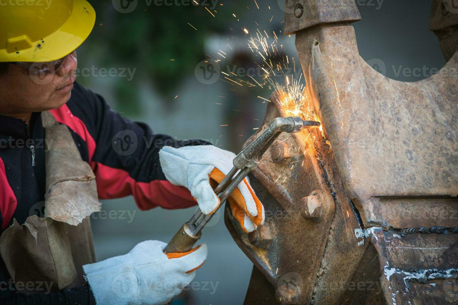 Cutting steel with gas,  gas welding  and oxy-fuel cutting are processes that use fuel gases and oxygen to weld and cut metals, respectively. photo