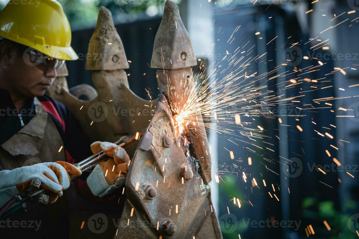 Cutting steel with gas,  gas welding  and oxy-fuel cutting are processes that use fuel gases and oxygen to weld and cut metals, respectively. photo