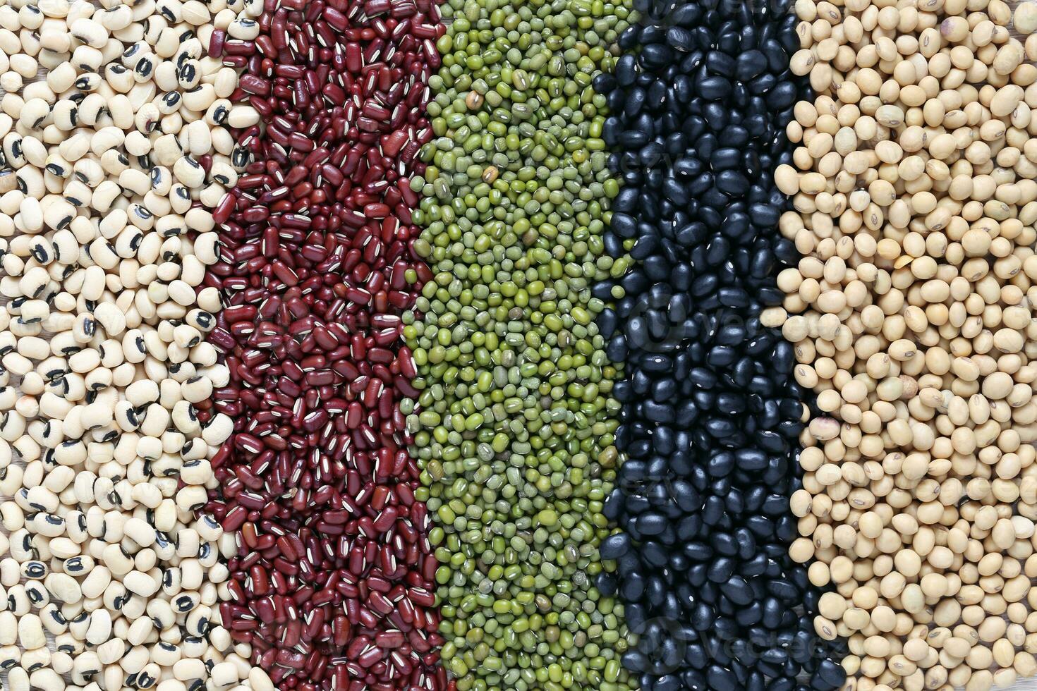 Top view of Five colored beans on wooder background, Healthy eating concept photo