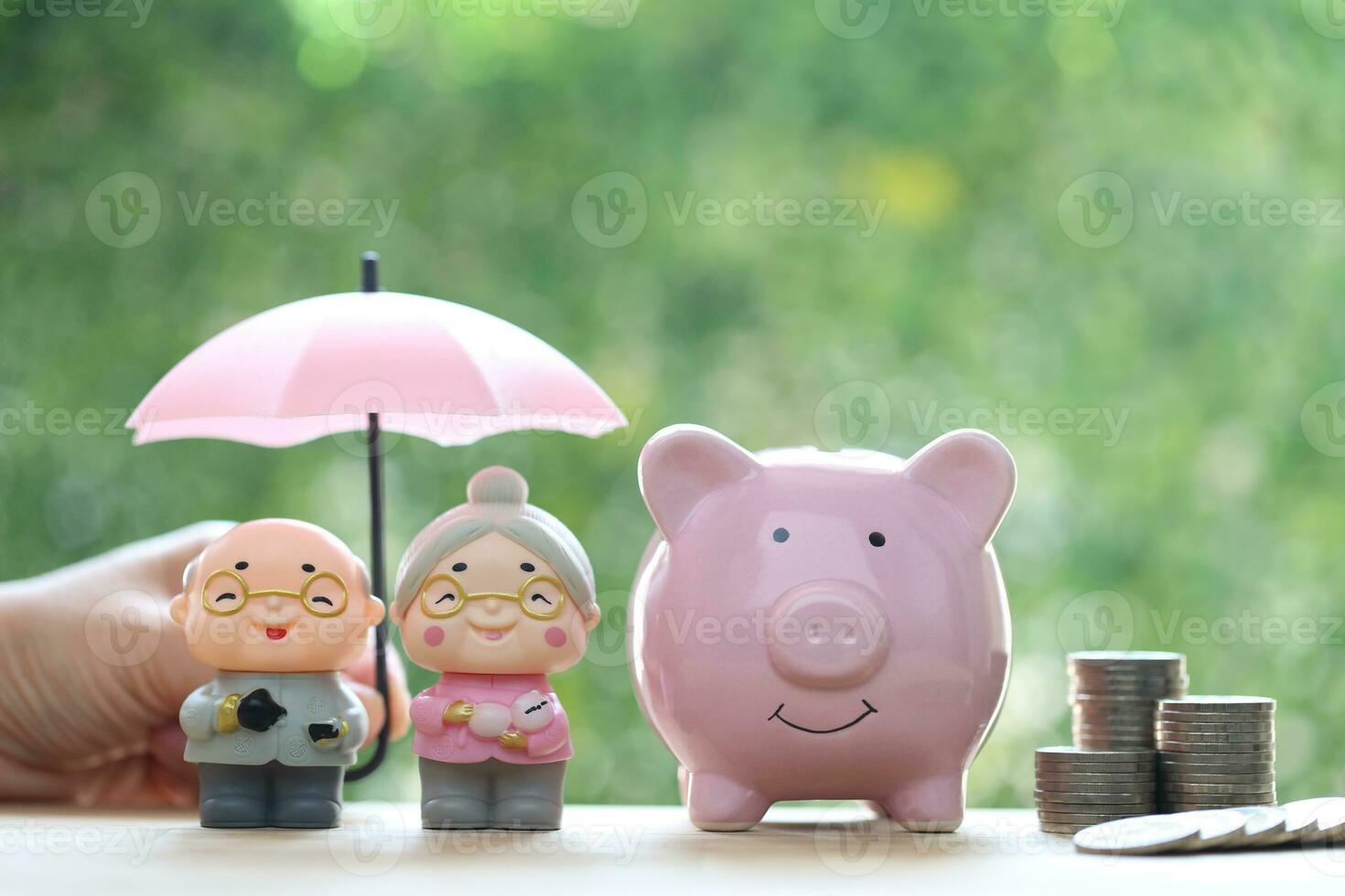Love couple senior and piggy bank on natural green background, Save money for prepare in future and pension retirement concept photo
