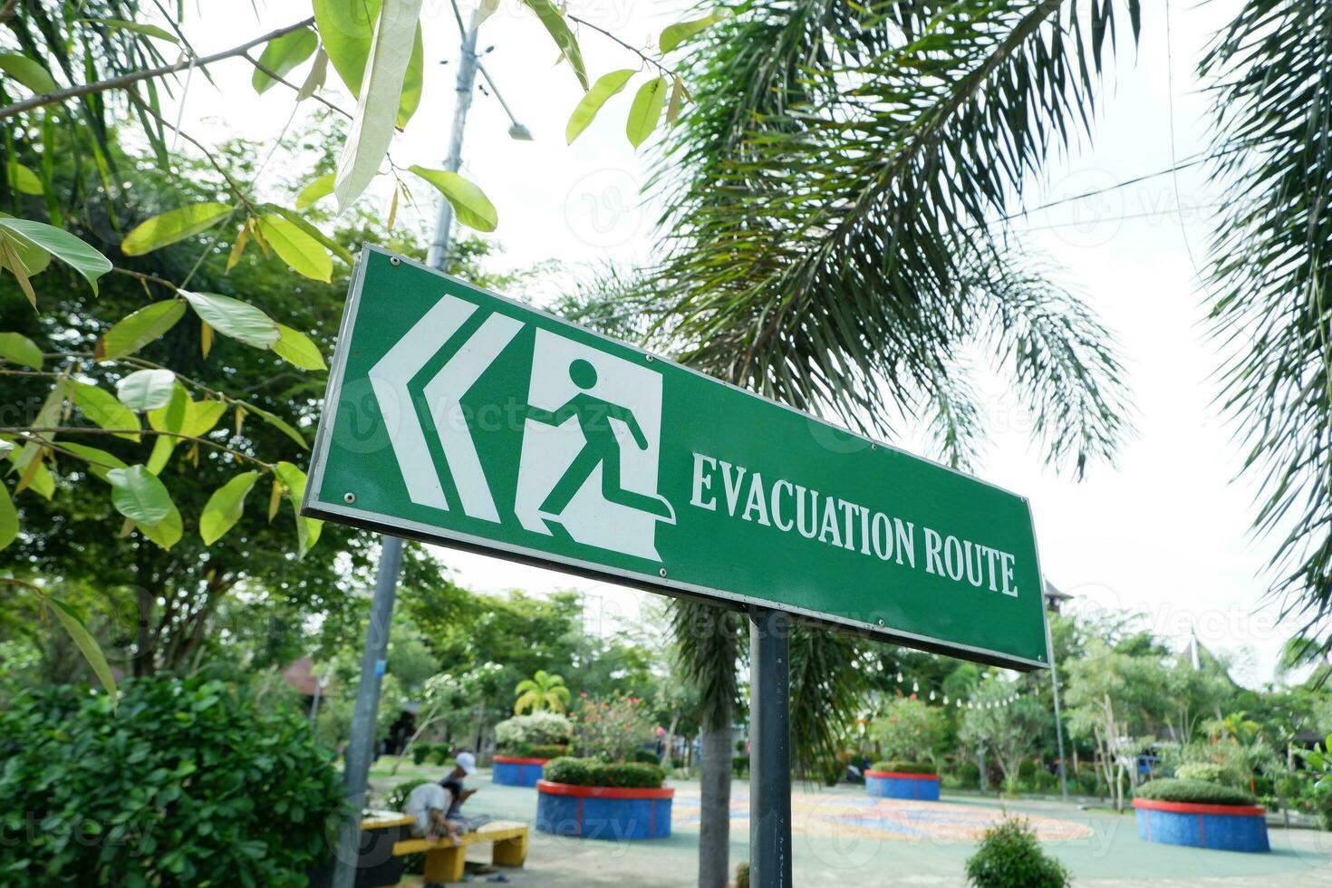 evacuation route warning boards in the park area. Directions for determining the evacuation route when a disaster occurs in the place. photo