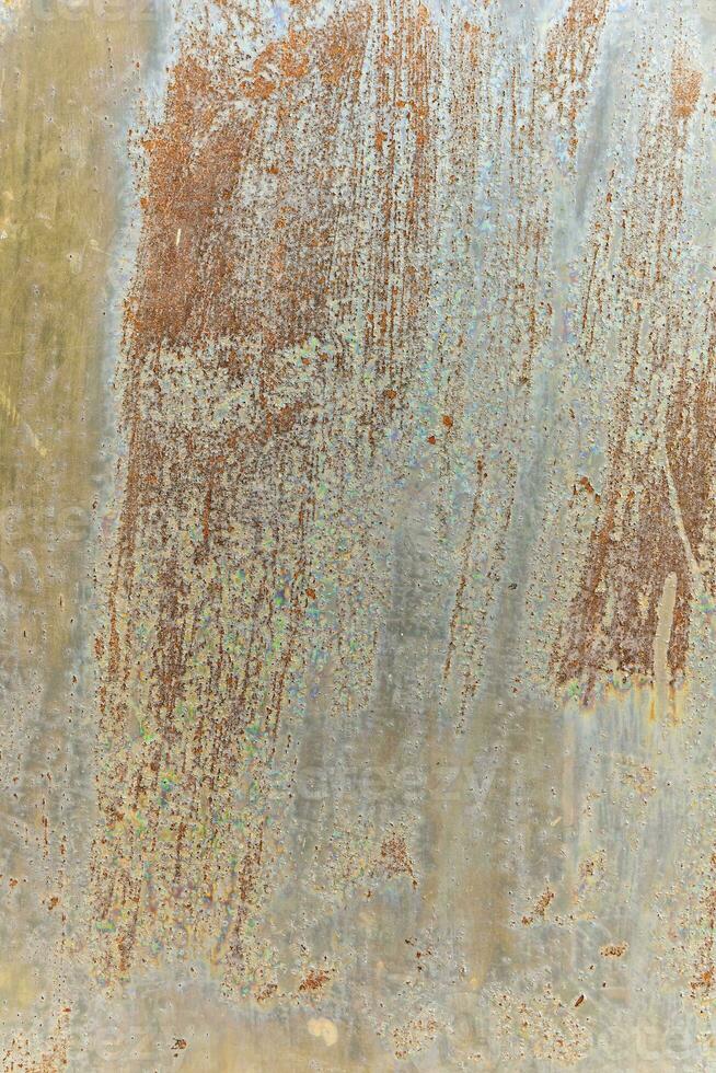 Aged faded colored grunge background with textured surface for design or background photo