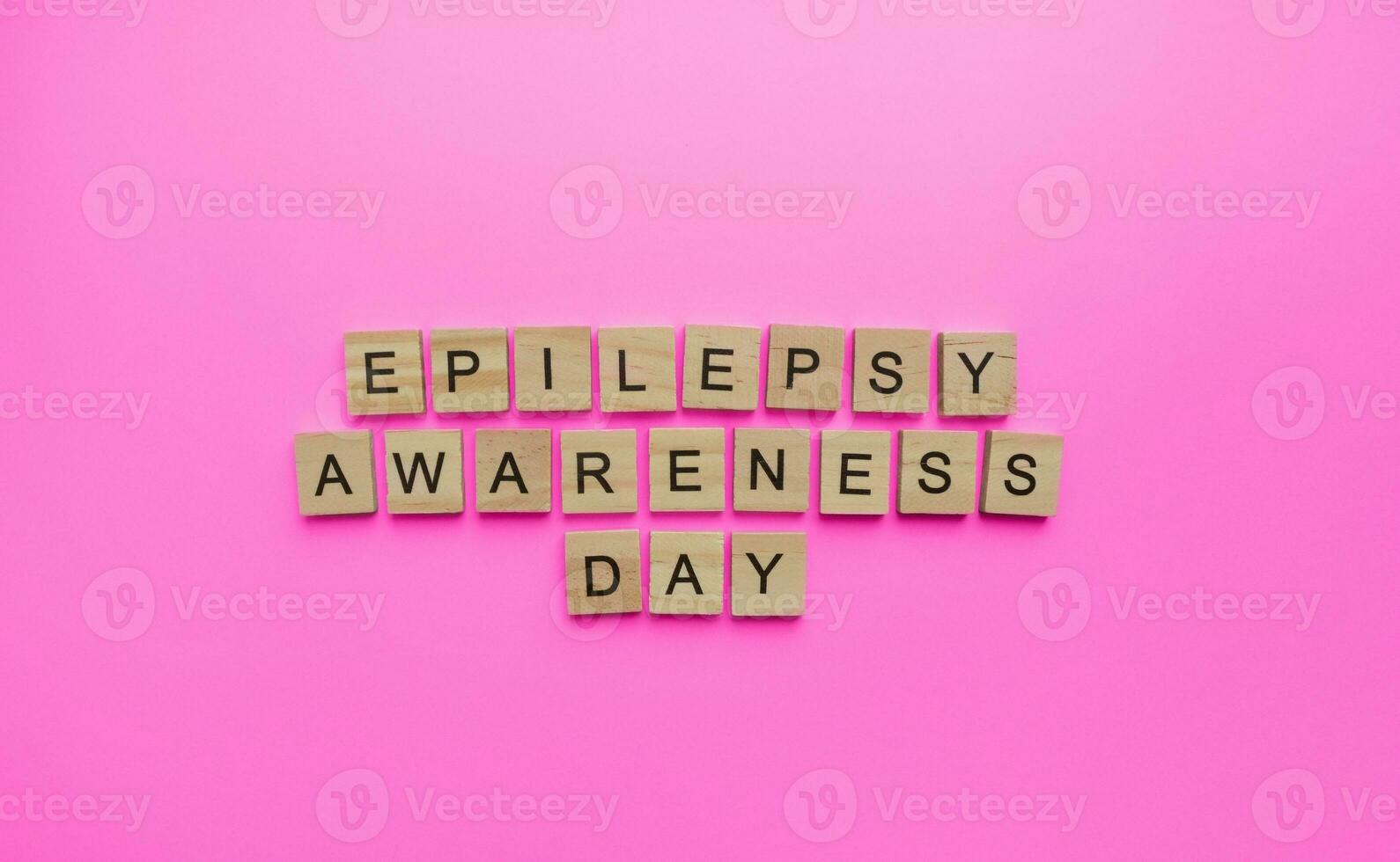 March 26, Epilepsy awareness day, Purple Day, minimalistic banner with wooden lettering photo