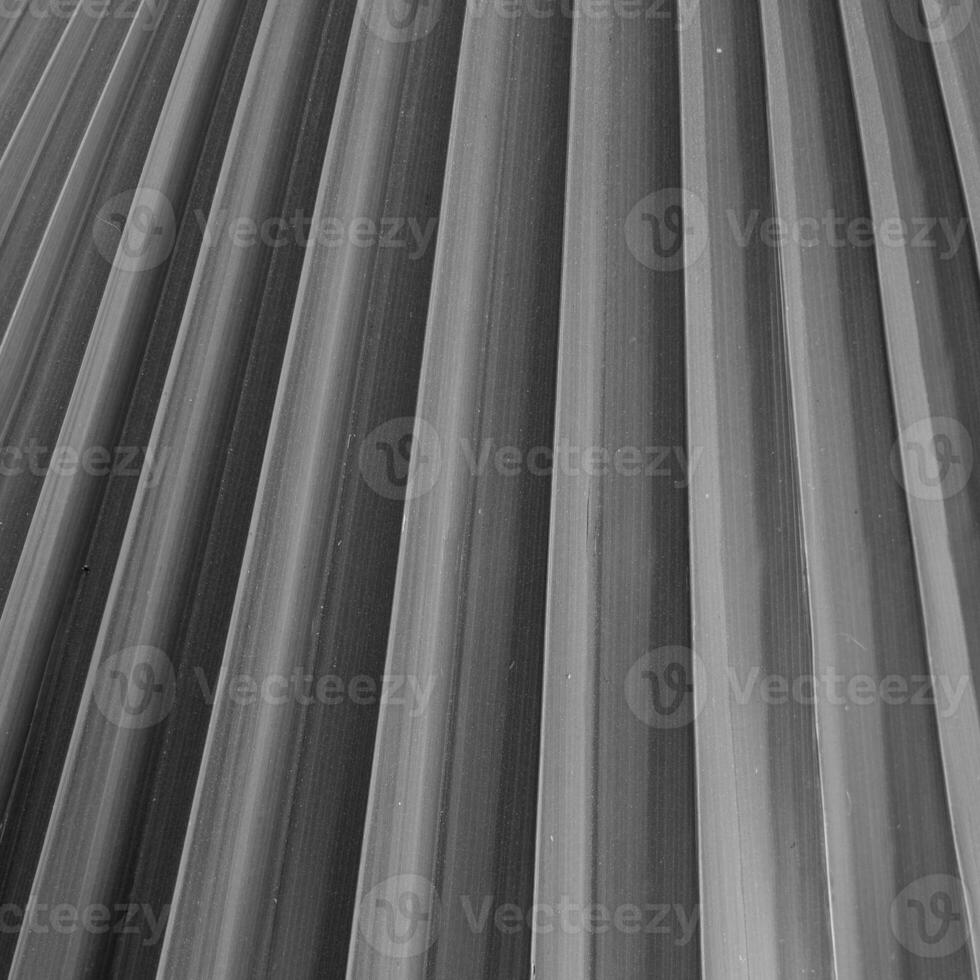 Abstract monochrome image of parallel lines with a gradient texture, suitable for backgrounds and graphic design elements. photo