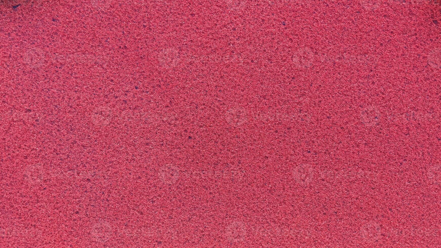 Red sandpaper texture background. Abstract background and texture for design. photo