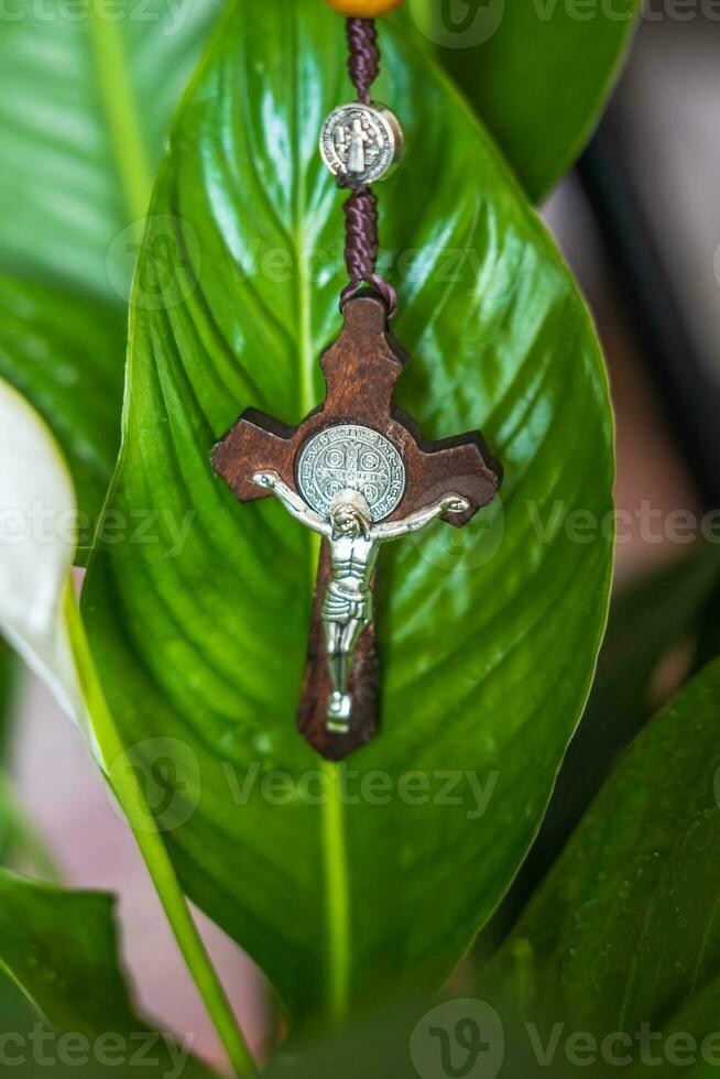 Religious Christian theme with Biblical concept of Jesus Christ crucified on the cross for the holiday of Forgiveness Sunday or Christmas photo