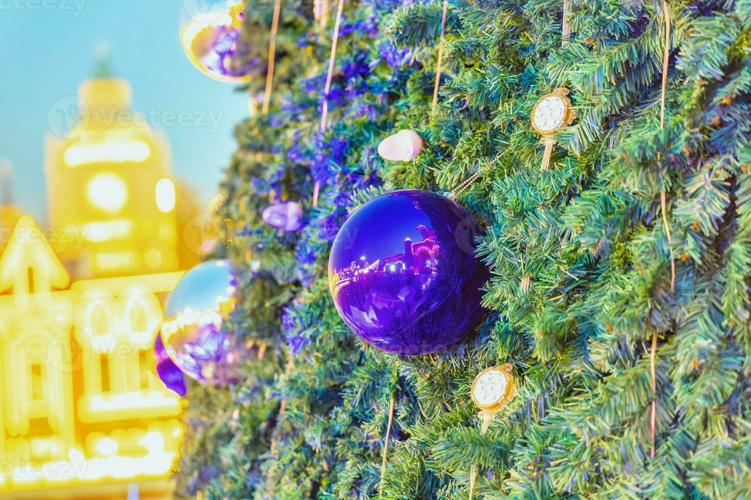 Background with blur on the theme of Christmas or New Year with toys and shining elements photo