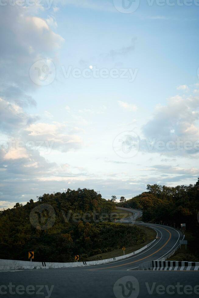 Beautiful curved road known as number 3 road on the high mountain along the way to Bo Kluea district in Nan province, Thailand. photo