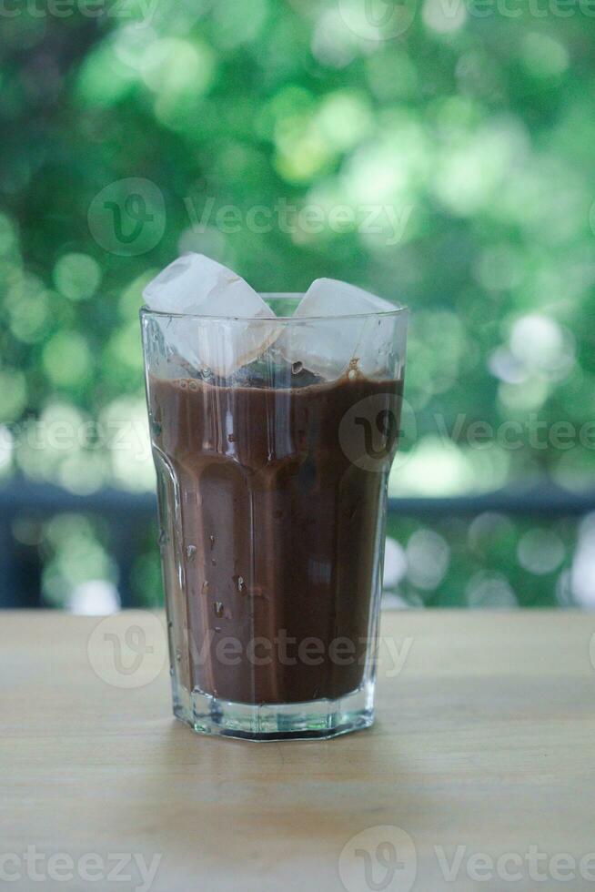Ice Mocha coffee served in glass with homemade square ice cubes. photo