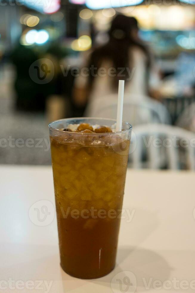 Close up glass of longan juice photo