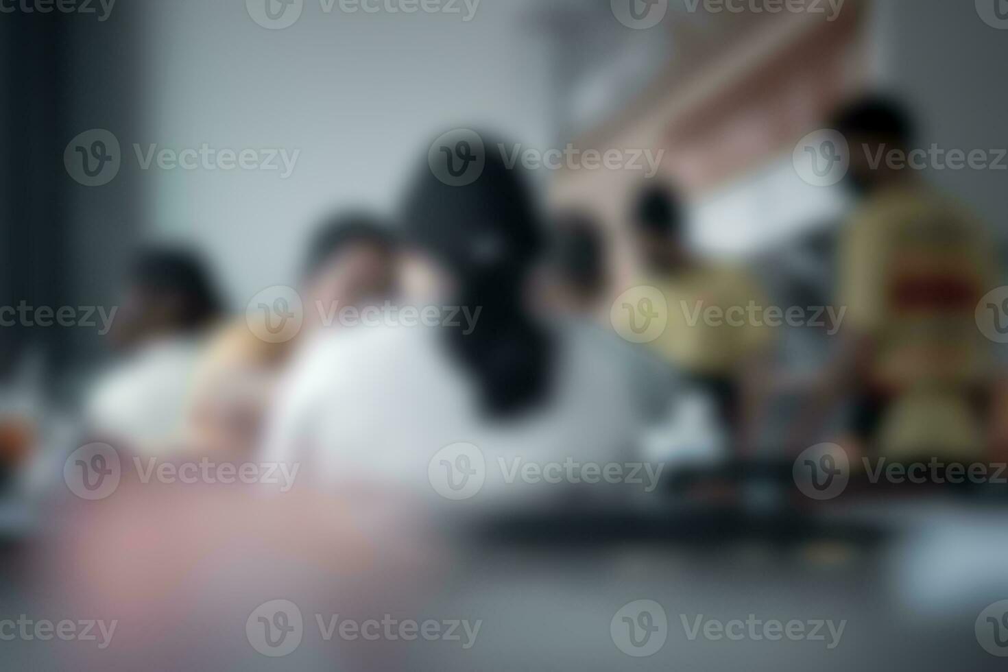 Blurred image of people sitting at the restaurant. photo