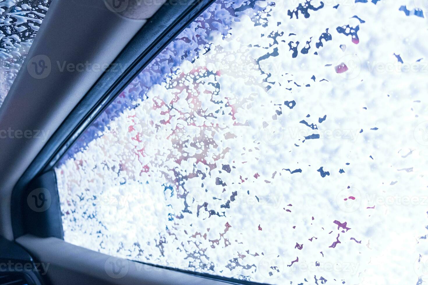Close up of car being washed photo
