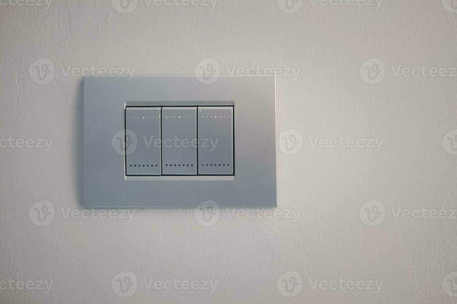 Electric light switch panel silver color. photo