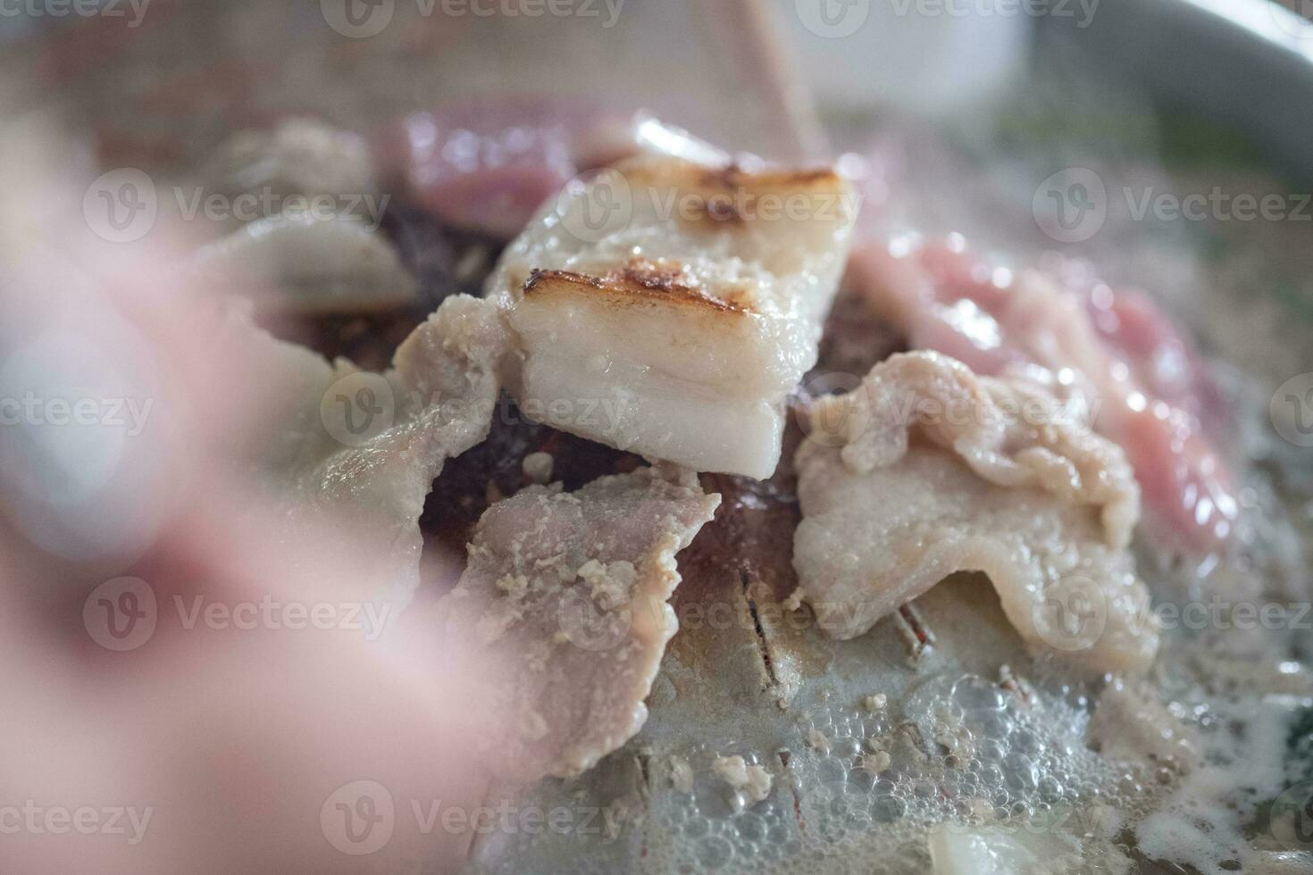 Thai barbecue Grill Pork on hot pan buffet photo