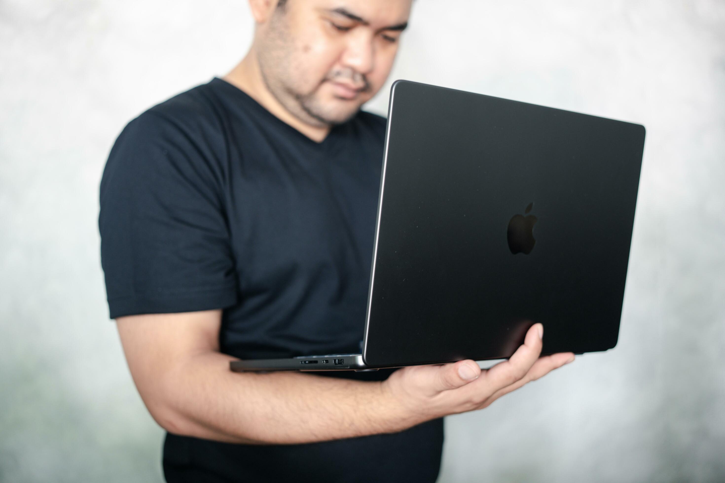 Bangkok, Thailand - January 6, 2024 Man use and test Apple
