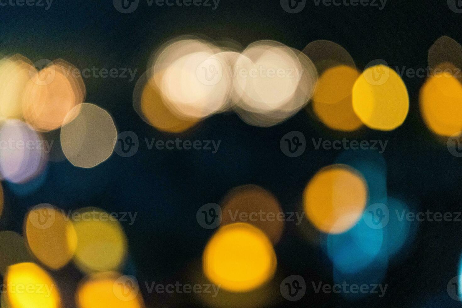 Abstract orange color circular bokeh from light for background photo