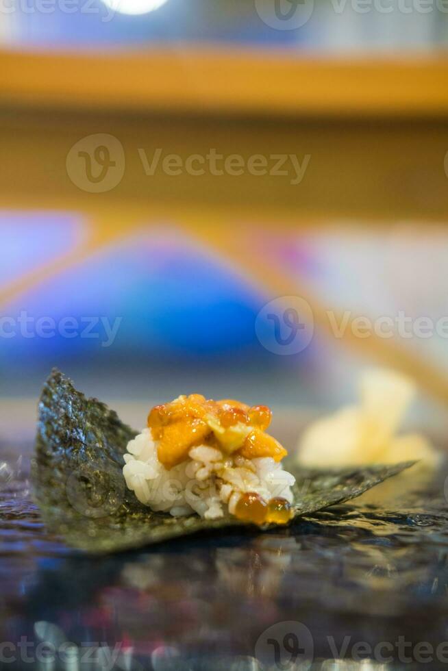 Uni Japanese sea urchin with rice and seaweed photo