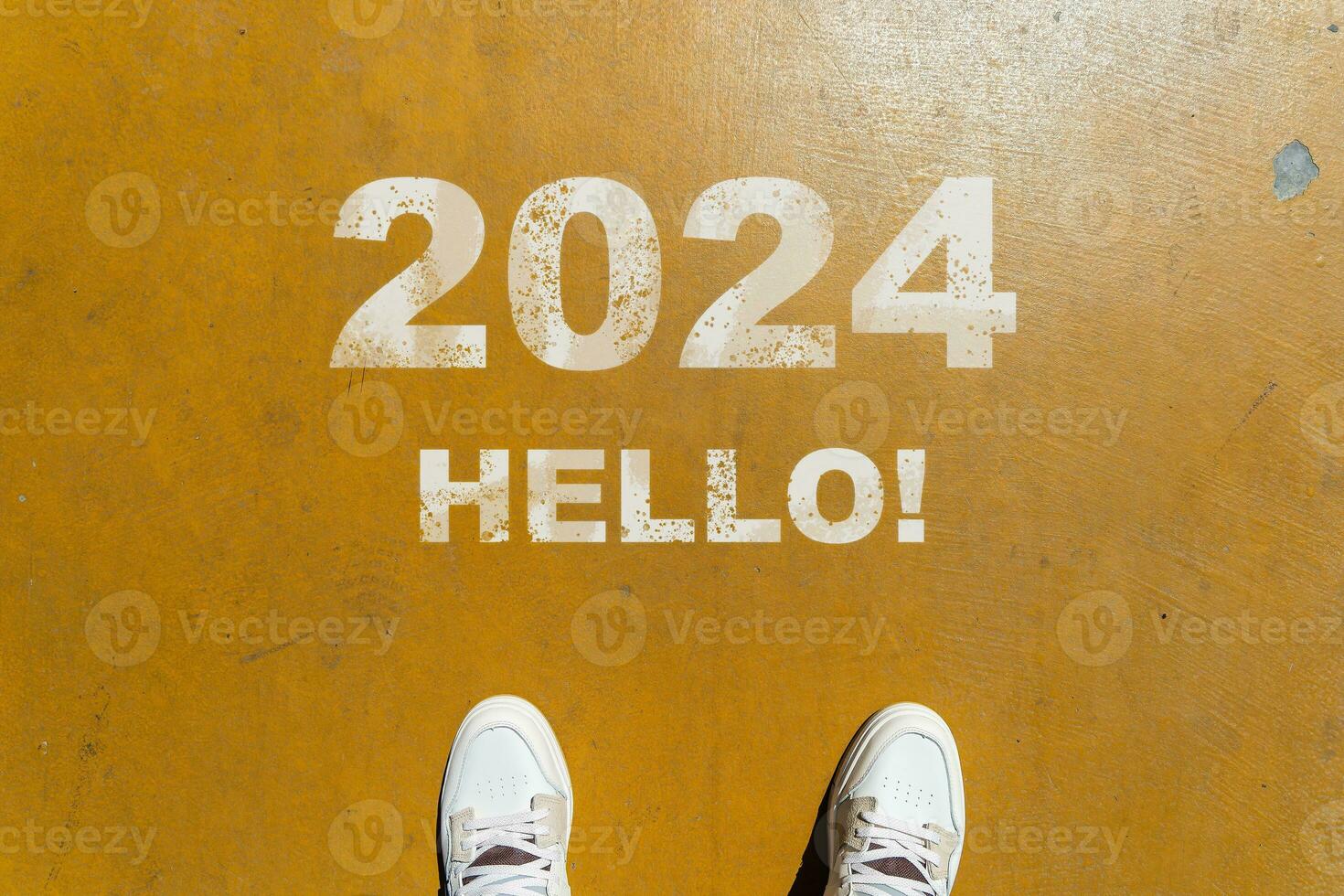 The beginning of 2024 is written on a colorful road. Conceptual photo of the coming New Year 2024. New year concept, motivation, business promotion, step forward, moving forward, hope