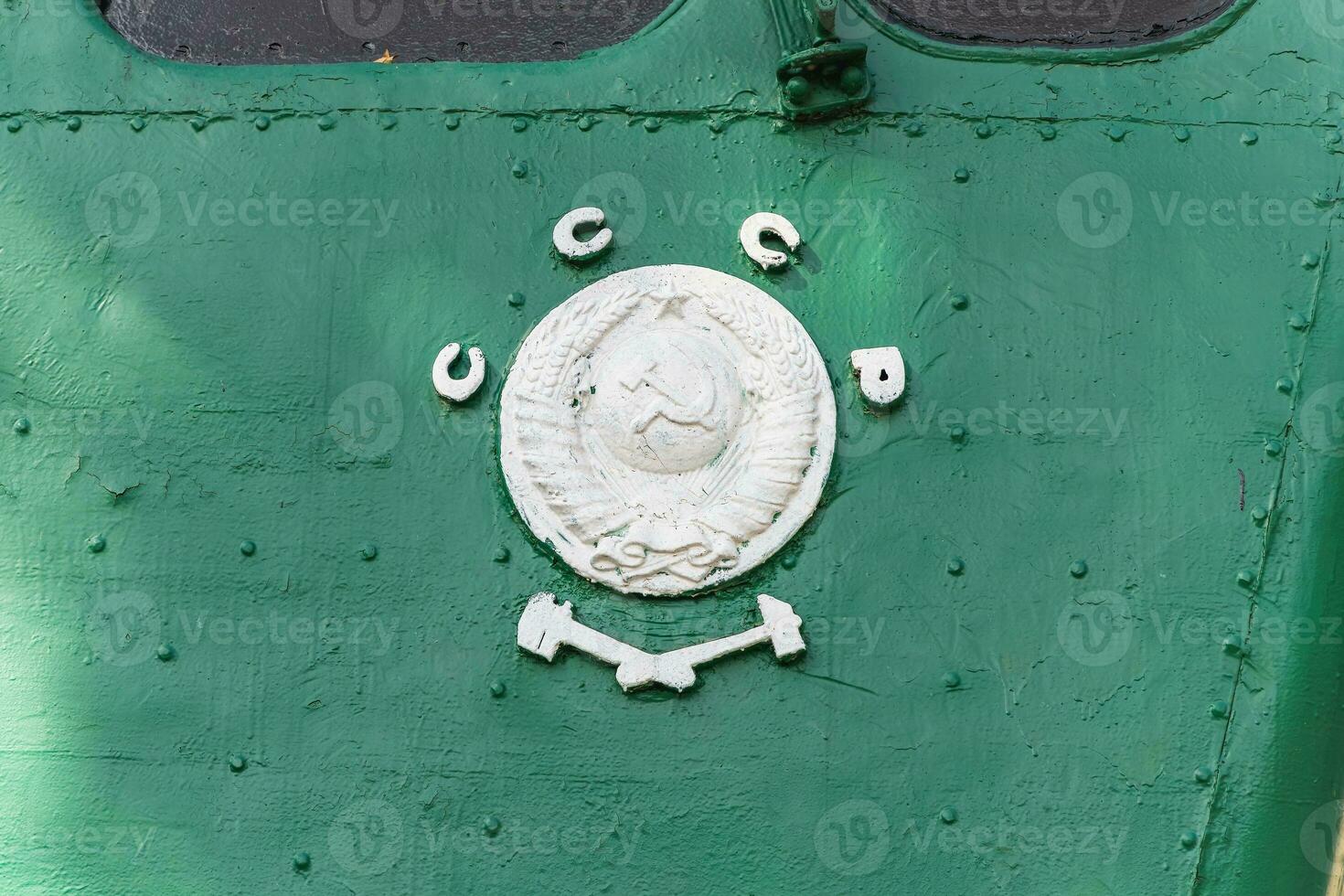 Text and numbers on a metal surface with the symbols of the USSR for design and commercial use photo