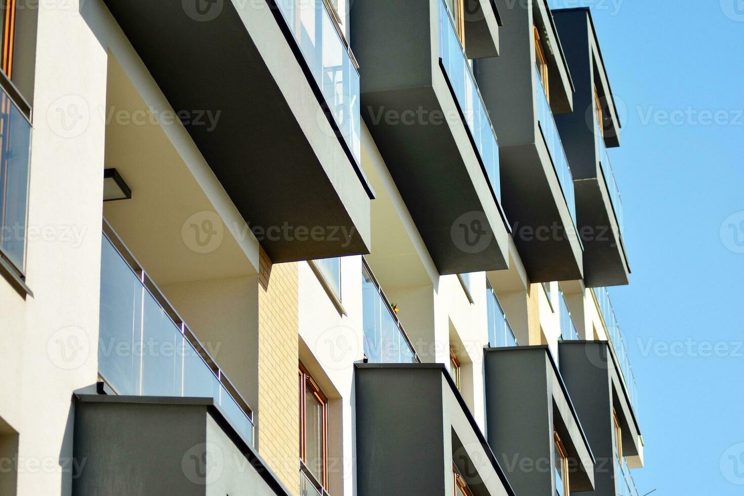 Modern and new apartment building. Multistoried, modern, new and stylish living block of flats. photo