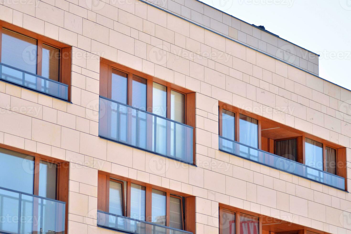 Modern and new apartment building. Multistoried, modern, new and stylish living block of flats. photo