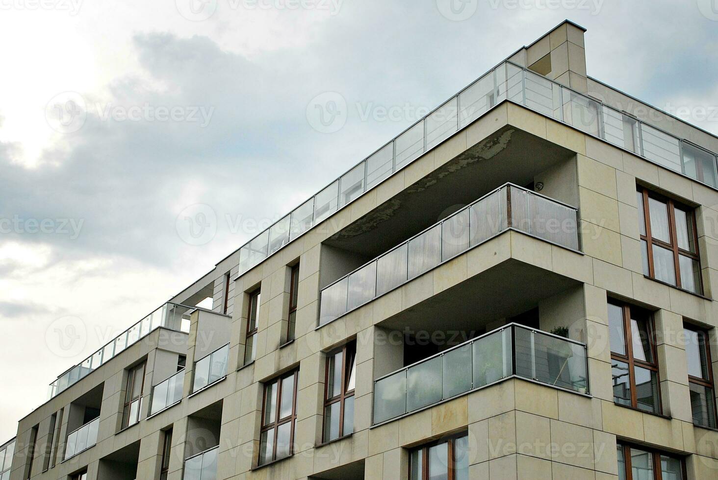 Modern and new apartment building. Multistoried, modern, new and stylish living block of flats. photo