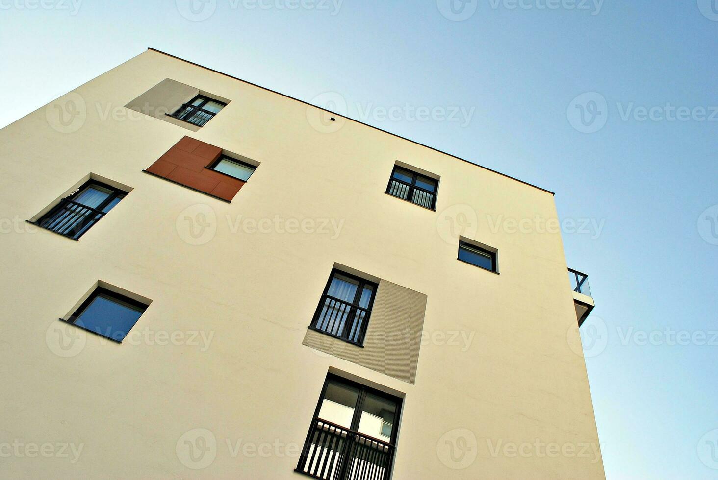 Modern and new apartment building. Multistoried, modern, new and stylish living block of flats. photo