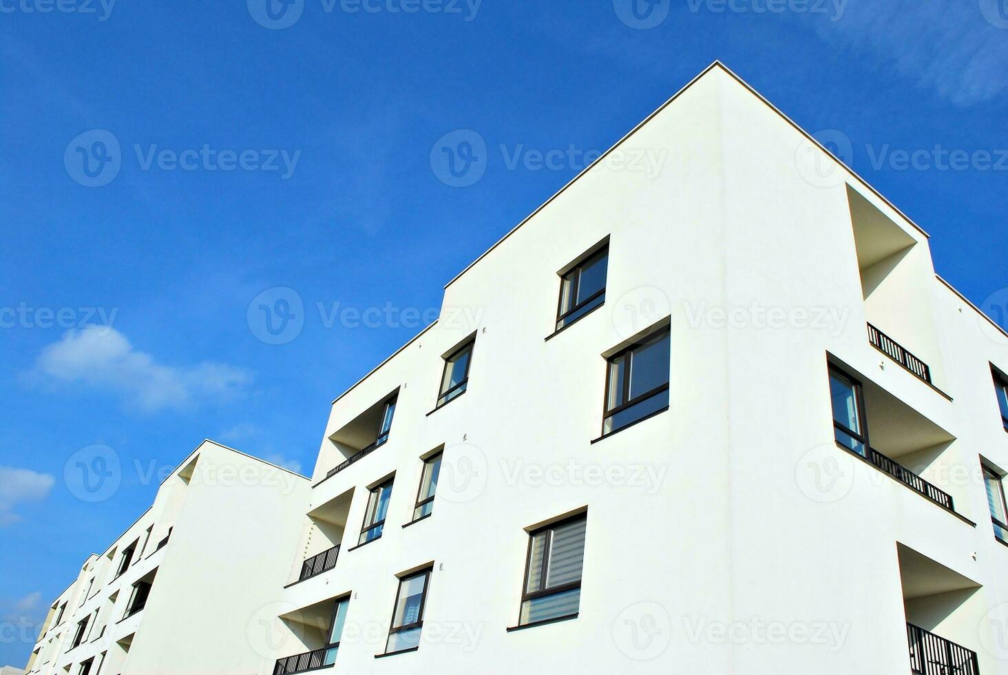 Modern and new apartment building. Multistoried, modern, new and stylish living block of flats. photo