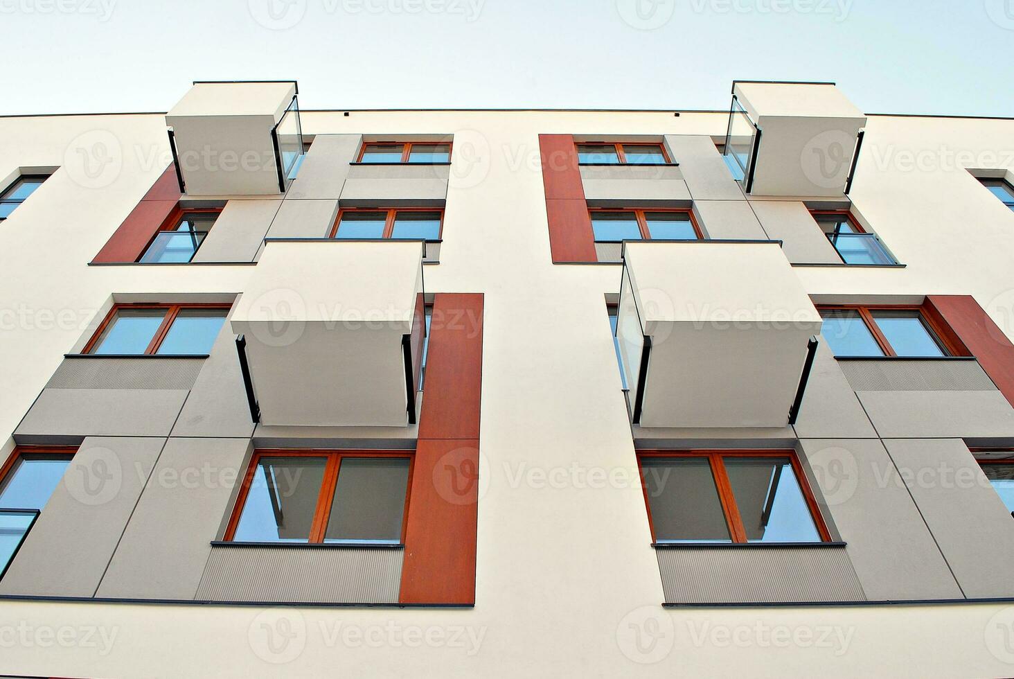 Modern and new apartment building. Multistoried, modern, new and stylish living block of flats. photo