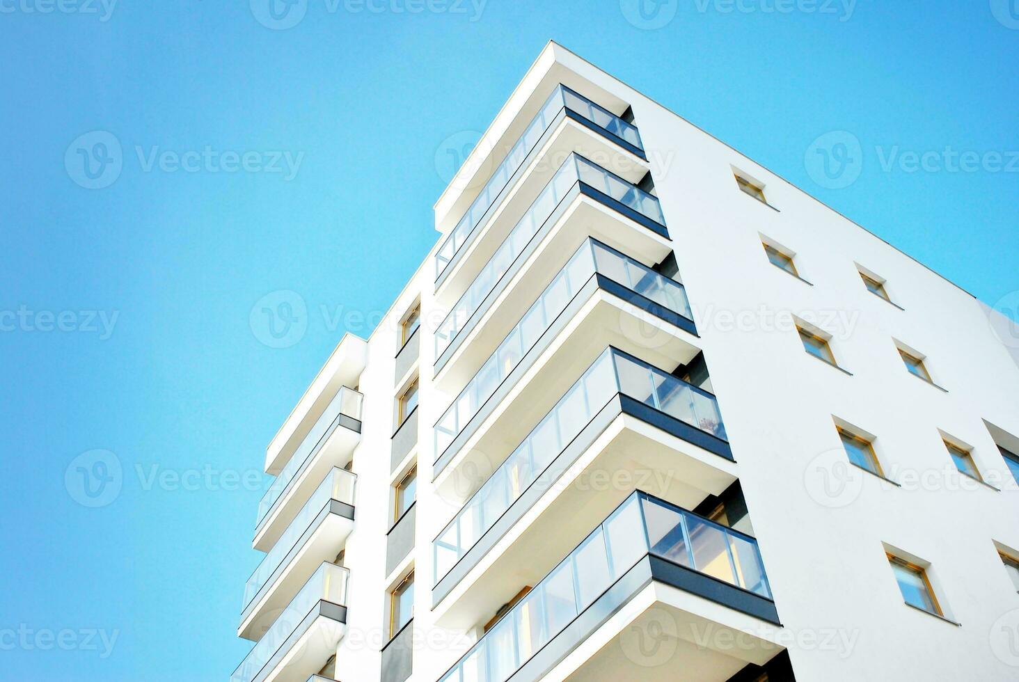 Modern and new apartment building. Multistoried, modern, new and stylish living block of flats. photo