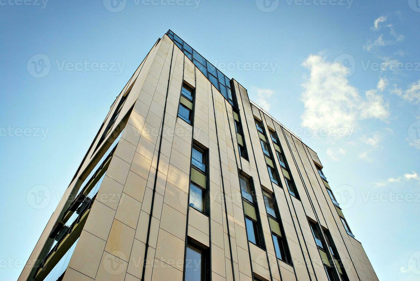 Modern and new apartment building. Multistoried, modern, new and stylish living block of flats. photo